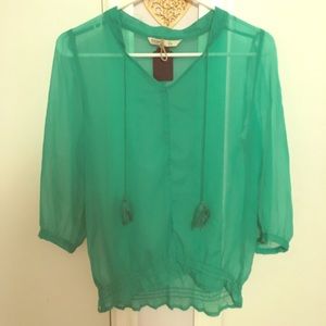 Beautiful sheer green tassel top!